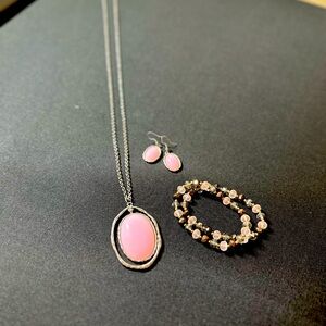 Pink and silver necklace, beaded bracelets, and matching earrings